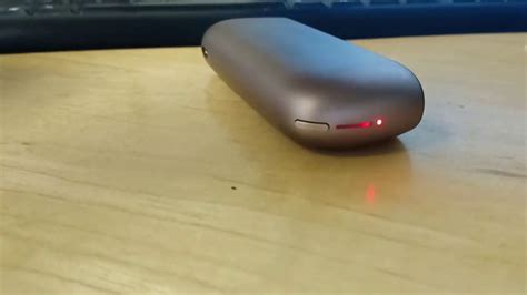 iqos light flashing red.